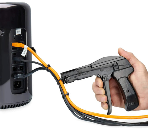 Hand using Zip Tie Gun And Cable Tie Install Tool With Adjustable Tension No Fuss Built In Cutter for cable management on a device.
