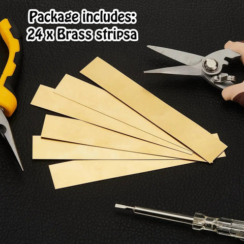 Brass Shim Set 6x1 Inch 24 Pcs Thicknesses 0.002 0.004 0.006 0.008 0.012 0.016 with tools on black surface