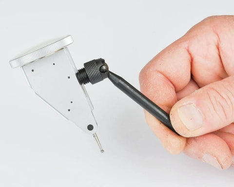 Hand holding Universal Indicator Holder With Swivel Mount For Dial Indicators, 0.25 Inch Shank, 2.75 Inch Length, Fowler