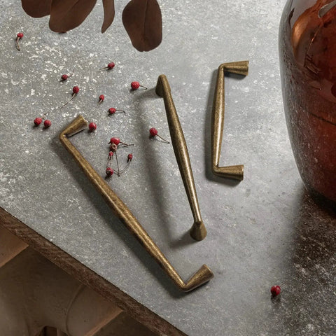 Vintage Brass Zinc Alloy Cabinet Handles Set Of 6 5.03 Inch Center To Center Antique Retro Pulls on stone surface