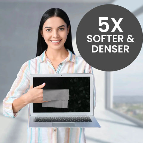 Woman holding laptop with Pack Of 30 Japanese Style Microfiber Glasses Cleaning Cloths For Eyewear, showcasing softness and density.