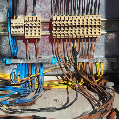 Two Set Ground Bar Kit With Ten Terminal Positions And Aluminum Ground Lug Bar For Electrical Connections, Heavy Duty Grounding Lugs installed in a distribution board