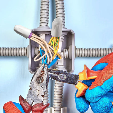Ceramic wire connectors 22–14 AWG, 40-pack, in a junction box with multicolored wires; pliers and gloves.