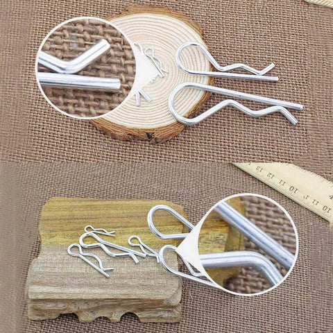 Close-up of 100Pcs R Type Cotter Pins Set In 4 Sizes M1x17mm M1.2x21mm M1.5x28mm M2x40mm 304 Stainless Steel displayed on wood