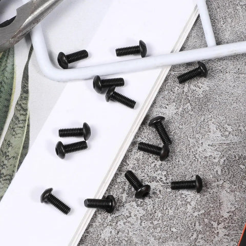 Image of 100 Piece M3 X 8mm Hex Socket Button Head Cap Screws Kit, Pro Grade Alloy Steel With Black Oxide Finish scattered on surface.