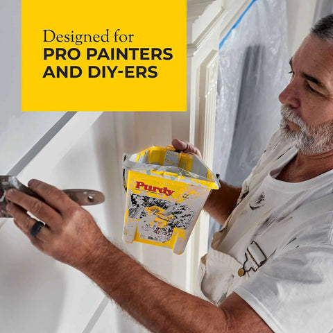 Professional painter using Purdy 140910300 Wire Brushes Block for surface prep, holding Purdy paint tray, designed for pros and DIYers.