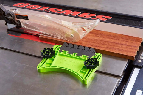 FeatherPRO FP1 Featherboard for table saws with EVA feathers, enhancing feed control and kickback resistance, placed on a saw table.