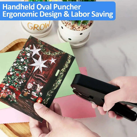 Person using a Heavy Duty Metal Slot Hole Punch Handheld Paper Punch for ID Cards and PVC Cards on festive paper