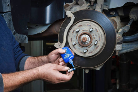 Applying Blue Medium Strength Thread Locker For Bolts And Fasteners Quarter Inch To Three Quarter Inch Keeps Vibration From Loosening Seals