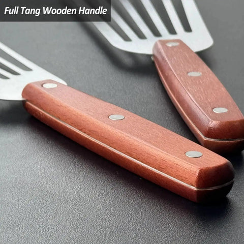Close-up of the 2 Pack Fish Spatula Turner Set Stainless Steel Slotted Spatulas For Flipping Turning Frying And Grilling with wooden handles.