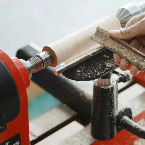 Close-up of Four Prong Spring Loaded Spur Drive Center For 2MT Wood Lathe Woodturning Tools With One Inch Diameter And Spring Retracting Center Pin