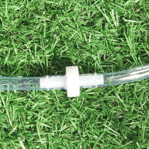 Side view of white plastic inline check valve on clear tubing for spa ozone system