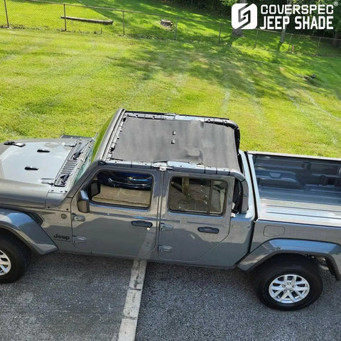 Top view of a Jeep Gladiator JT with an installed full-length sun shade roof bikini cover for UV block and wind noise reduction.