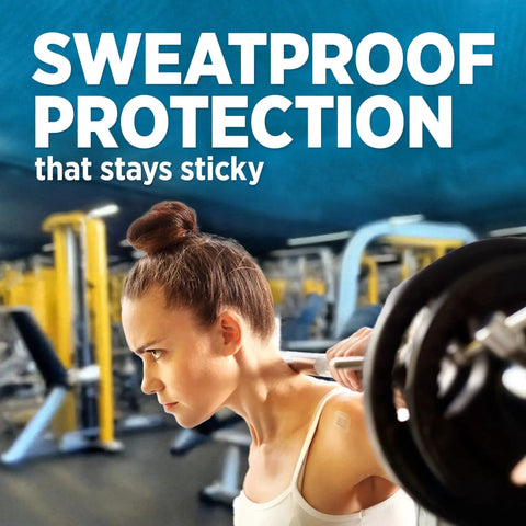 Woman lifting weights in gym shows sweatproof protection benefits of Clear Waterproof Adhesive Bandages For Minor Wounds.
