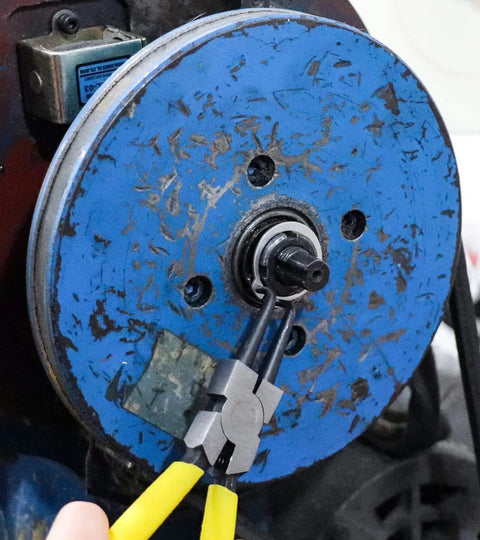 7 Inch Snap Ring Pliers Set Beefy Built Heavy Duty Internal External Circlip Pliers Kit in use on machinery component
