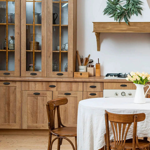 Rustic kitchen with wooden cabinets featuring 10 Pack Matte Black Cup Pulls Three And Three Quarters Inch Hole Center Zinc Alloy Cabinet Handles.