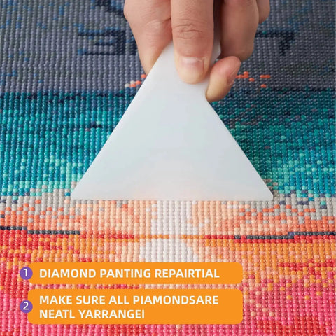 Hand using triangle tool for 46 Piece DIY Diamond Painting Tools And Accessories Kit With Multiple Pen Sizes Tweezers Glue Diamond Correction