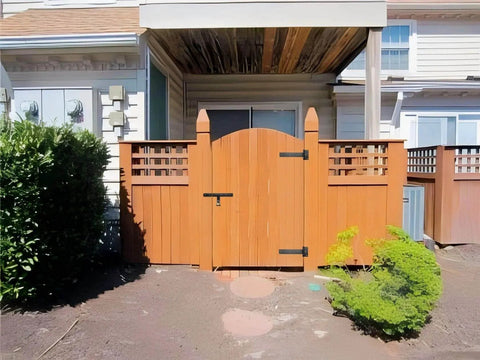 Wooden gate with Industrial Strength 12 Inch T Strap Gate Hinges 4mm Thick 180 Degree Swing Rust Proof Black Steel for garden gates.