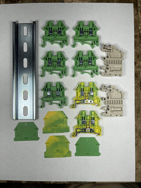UL Listed AC DIN Rail Terminal Block Kit With Ground Blocks, Jumpers, And End Covers, 20A 600V components displayed
