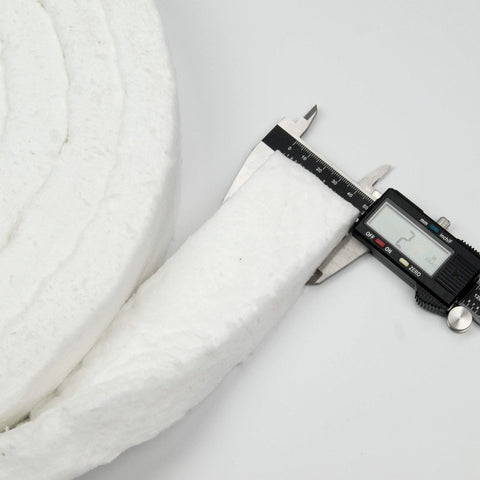 Lynn Manufacturing ceramic fiber blanket strip, white high‑temperature insulation; caliper shows about 2 in width.