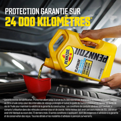 Premium Full Synthetic 0W-20 Motor Oil Made With Natural Gas, 5 Liter pouring into a funnel for engine oil change.