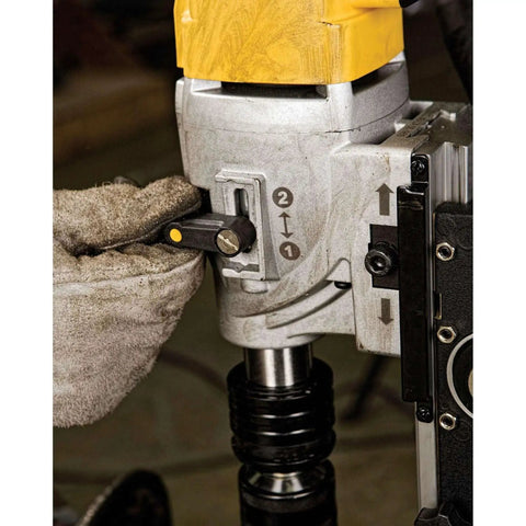 Close-up of Magnetic Drill Press With 2 Inch Capacity And 4 Inch Travel 10 Amp Motor Quick Change Chuck 2 Speed Settings Overload Protection Magnetic Coolant Bottle Heavy Duty Dewalt DWE1622K For Tough Jobs showing speed settings adjustment.