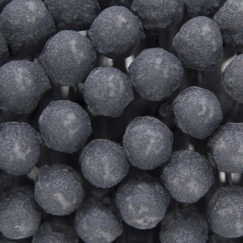Close-up of the Flex-Hone Four And One Eighth Inch Diameter 240 Grit Silicon Carbide Honing Tool bristles for mild steel.