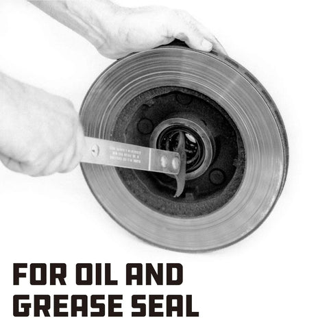 Demonstration of Heavy Duty Seal Puller for effortless oil and grease seal removal, dual tips, ergonomic grip handle in use