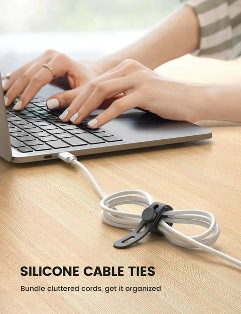 Silicone Cable Ties 10 Pack Cord Organizer With Secure Lock Buckle in use on a laptop cable on a desk