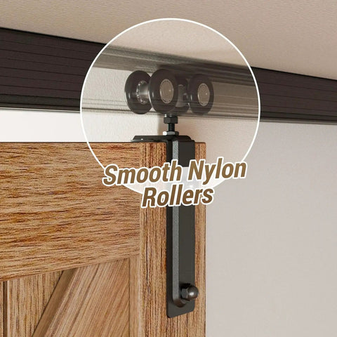 Ceiling Mount Box Rail Barn Door Hardware Kit with smooth nylon rollers on wooden door panel for quiet operation.