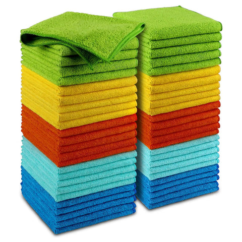 Premium Microfiber Cleaning Cloths 50 Pack For Cars Home SUV Windows And Kitchen Ultra Absorbent Quick Dry Rags stacked in various colors.