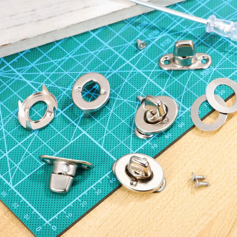 Overhead view of Kisangel 20-set stainless steel marine twist-lock fasteners with eyelet screws for canvas boats.