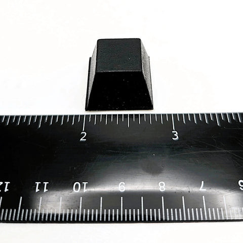 Three Quarters Inch Wide Pyramid Silicone Rubber Bumper Feet With Adhesive Backed Pads Five Eighth Inch Thick next to ruler