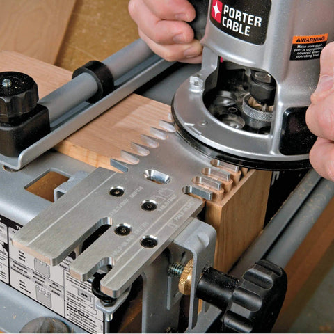 Close-up of Dovetail Jig Kit For Woodworking With Mini Templates 4211 4213 And 4215 in use on a wooden panel with router.