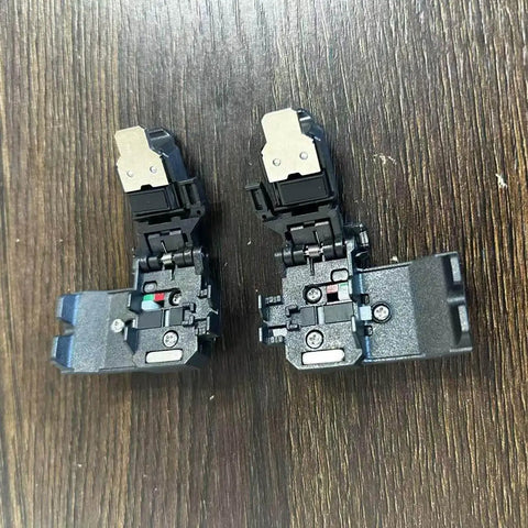 SP-03 Original Fiber Holder Chucking Jig for Fusion Splicer Clamps on wooden surface