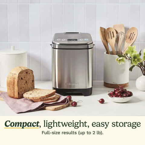 Stainless Steel Automatic Bread Maker With 12 Menu Presets 3 Crust Colors And 3 Loaf Sizes Up To 2 Lb on kitchen counter with bread