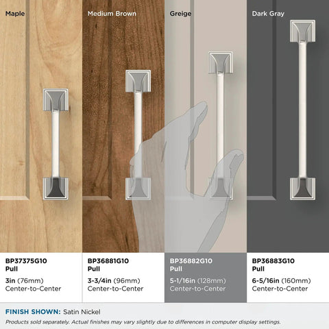 Comparison of cabinet pulls with various finishes; Satin Nickel Exceed Transitional Cabinet Pull Five And One Sixteenth Inch Center To Center pictured on right