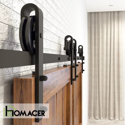 Beefy Black Rustic Sliding Barn Door Hardware Kit For Two Doors, 16 Foot Flat Track With Spoke Wheel Rollers installed view