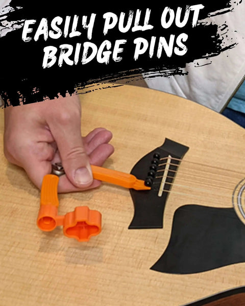 3 In 1 Guitar String Winder Cutter And Bridge Pin Puller For Acoustic And Electric Guitars Wind Strings Fast Cut Off Excess String And Pull Pins Out With Ease, showing a hand using the tool to remove bridge pins from an acoustic guitar.