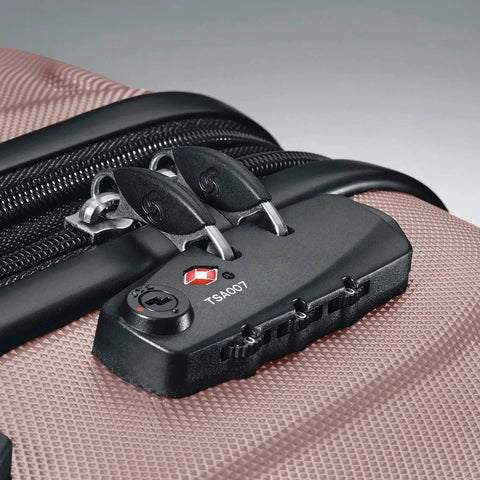 Close-up of TSA lock on Omni PC Hardside Expandable Luggage Set With Spinner Wheels 20 24 28 Pink For Travel by Samsonite.