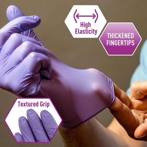 Person demonstrating high elasticity and textured grip of Powder Free Nitrile Exam Gloves Iris Blue Medium Box Of 100 For Medical Labs Hospitals And Professional Use With Textured Fingertips For Superior Tactile Sensitivity Durable Stretchable Puncture Resistance Latex Free.
