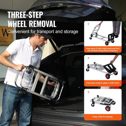 Side view of a person loading an aluminum folding hand truck with wheels into a car trunk.