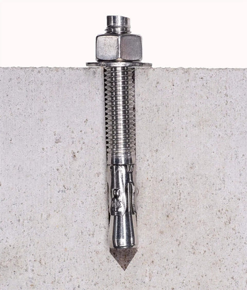 Bolt Dropper 1/2 Inch By 4-1/2 Inch Wedge Anchor installed in concrete with stainless steel washer and nut