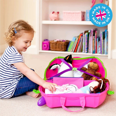 Child playing with Ride On Kids Suitcase For Travel And Fun Tow Along Toddler Luggage With Wheels Carry On Cute Pink Bag
