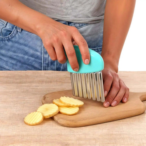 Person using 2 Pack Crinkle Cutter For Veggies And Fruits With Stainless Steel Wave Blade Durable Wavy Slicer For Carrots Onions Cheese And More Easy Grip Kitchen Gadget For Safe Clean Cuts And Fun Kitchen Creations on potatoes