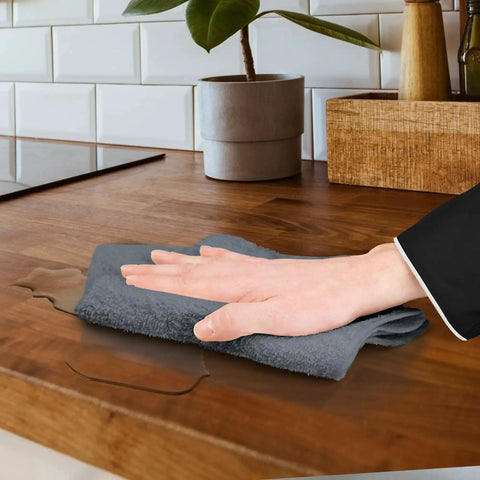 Person cleaning wooden countertop with gray 14x17 inch bar towel from Pack Of 60 14 By 17 Inch Bar Towels For Cleaning 100 Percent Cotton Absorbent And Reusable Multipurpose Terry Cloth Shop Rags Gray Great For Heavy Duty Cleaning Spills And Damp Surfaces In Home Garage And Workshop