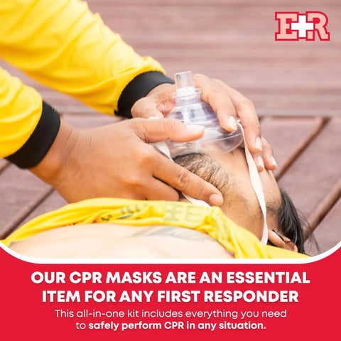 First responder using Adult And Infant CPR Mask Kit For Rescue on person lying on ground, showcasing one-way valve mask in use.