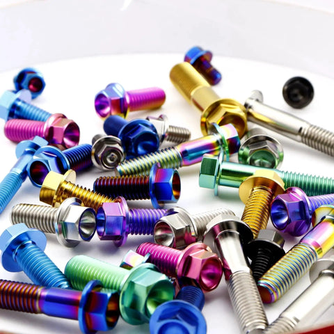 Assorted colorful titanium hex head bolts on display, including Burnt Blue Titanium Flanged Hex Head Bolt M8x1.25x20mm Pack Of 5 6AL4V.