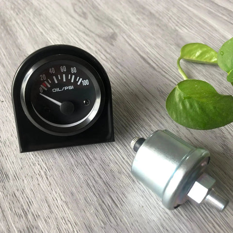 Pro Grade 52mm Oil Pressure Gauge Kit With Sensor For Gearheads In Cars And Trucks 0 To 100 PSI Range 12V DC Power on wood surface