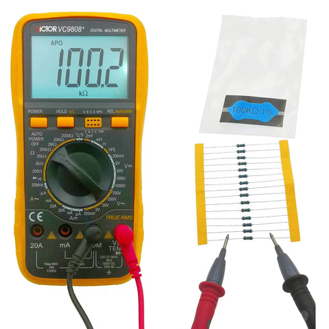 Victor VC9808+ handheld digital multimeter with red/black probes; resistor strip and 100kΩ 1% bag